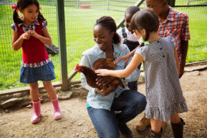 kids with chickens